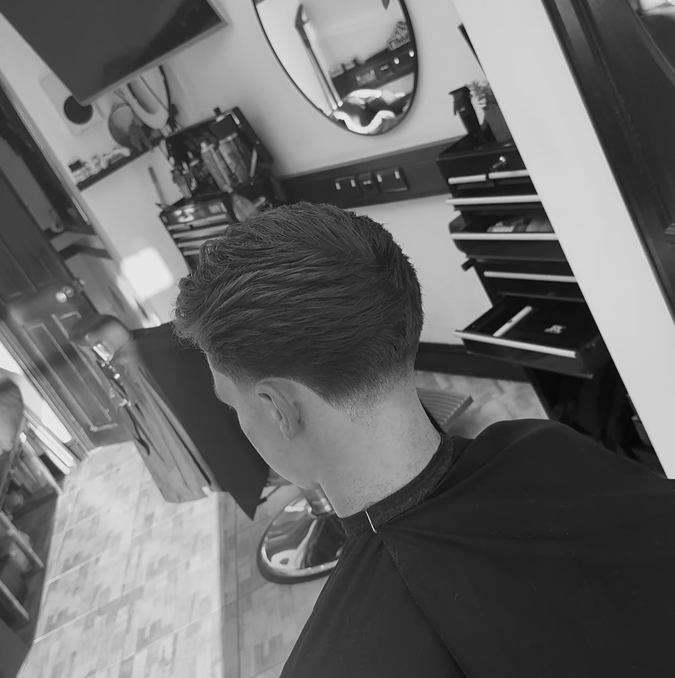Taper with a swept-back top, inside the shop