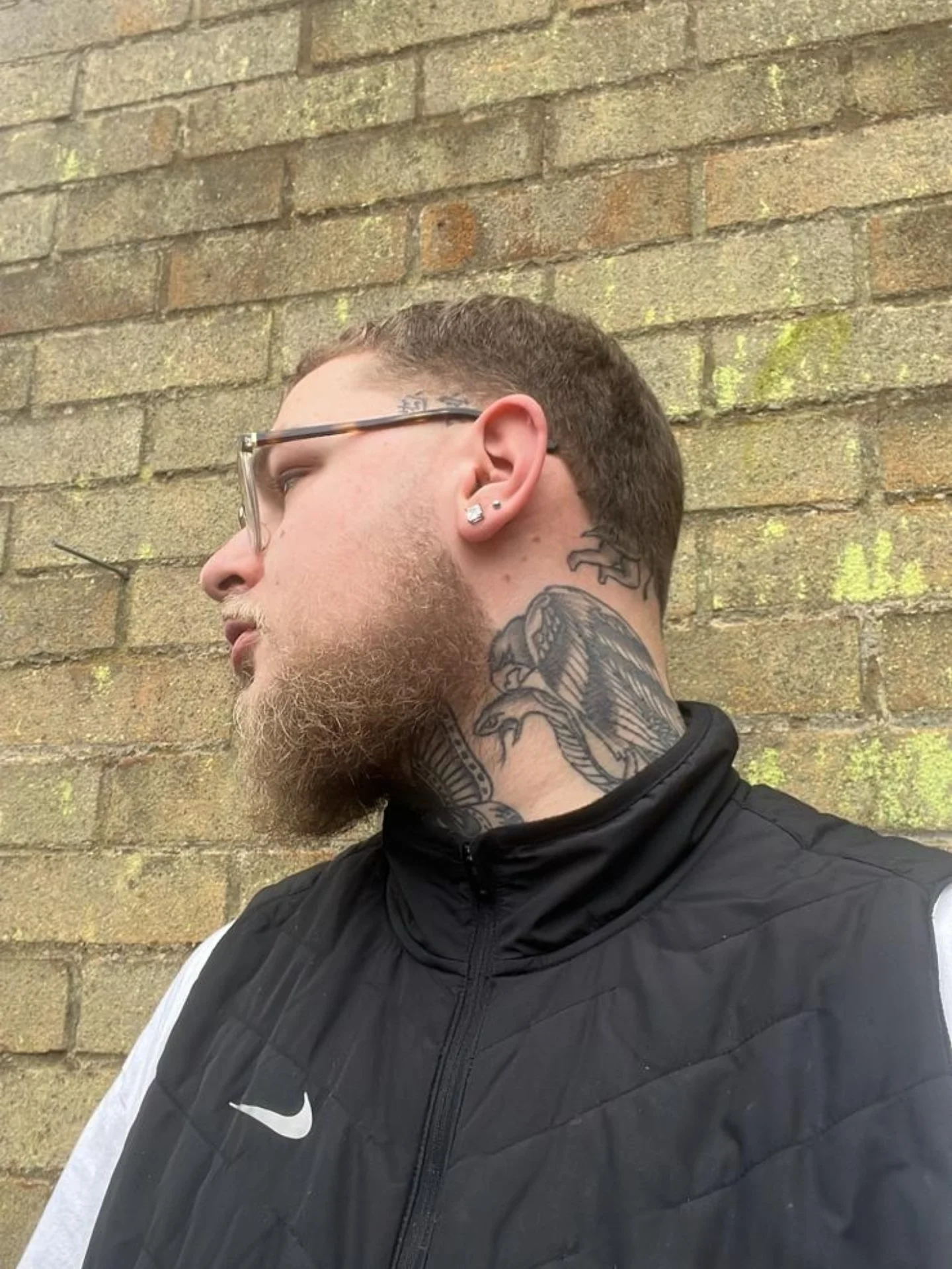 Full beard shaped up with a taper